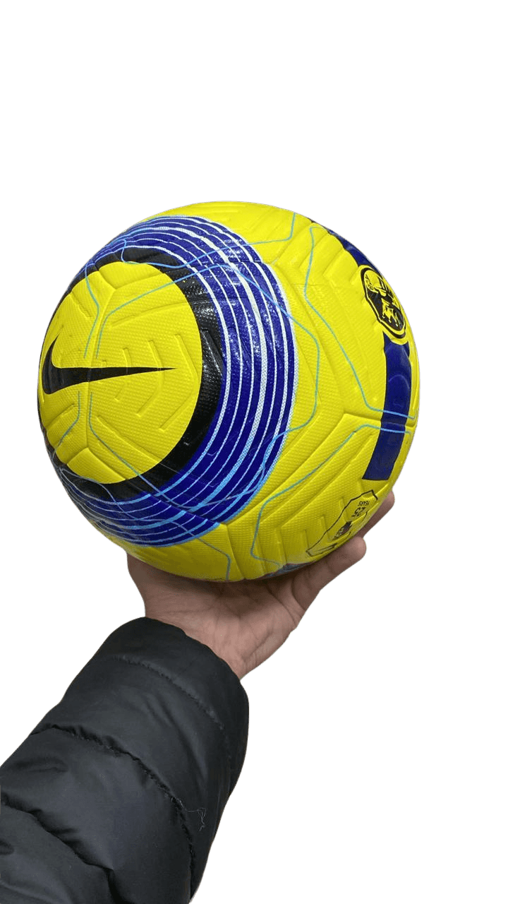 High-visibility yellow and royal blue competition football with molded aerodynamic groove channels